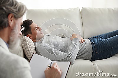 Psychotherapist and patient. Hypnotherapy session Stock Photo