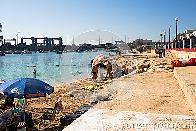 Birdzebbugia, Malta, August 2019. The promenade and the beach near the commercial port. Editorial Stock Photo