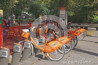 Public bikes for rent in the Old town of Vilnius, Lithuania Editorial Stock Photo