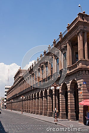 Public building with arcade and luminaires in San Luis Potosi Stock Photo