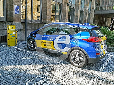 Public charging point of electric vehicles with E.ON Editorial Stock Photo