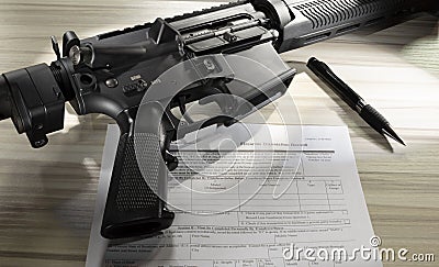 Public domain background check form with AR-15 Stock Photo