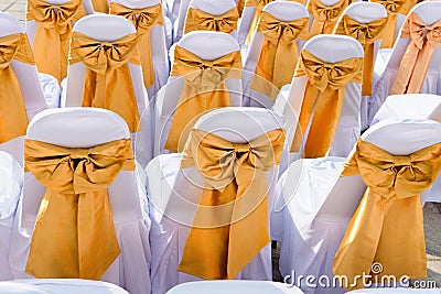 Public Event Seating with Silk Chair Covers and Sashes Stock Photo