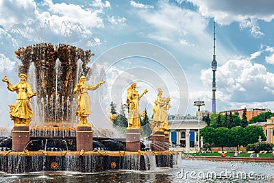 Public fountain of friendship of the people view at VDNH city park exhibition, blue sky and clouds in Moscow, Russia Editorial Stock Photo