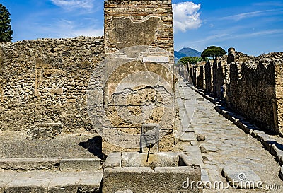 public fountain in the streets of Pompeii Stock Photo
