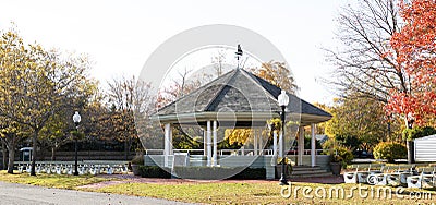 Public Gazebo in Babylon Village with colorful autumn trees Stock Photo