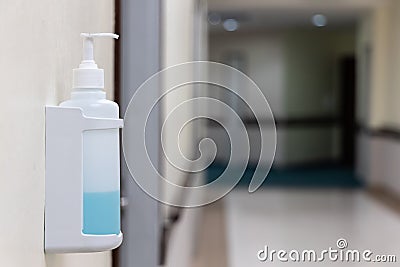 Public hand disinfectant sanitizer dispenser available in hospital for hygiene Stock Photo