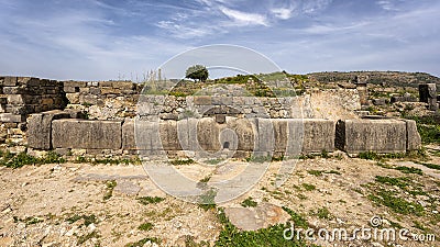 The public latrine at the Archaeological Site of Volubilis in Morocco. Stock Photo
