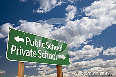 Public or Private School Green Road Sign Over Sky Stock Photo