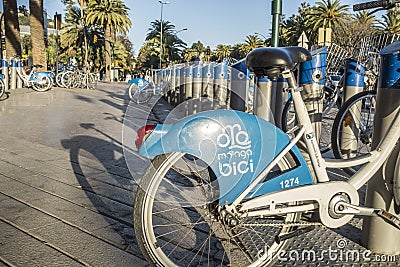 Public rent bikes street historic center of Malaga, Spain. Editorial Stock Photo