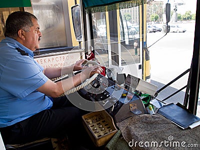 Public transport driver driving city bus in Russia Editorial Stock Photo