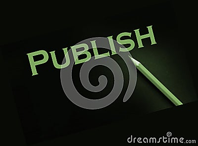 Publish word printed in yellow on black paper. Publishing business concept Stock Photo