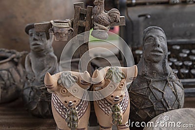 The Pucara bulls are placed on the roofs of houses. Crafts, Peru Stock Photo