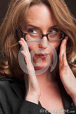 Puckering businesswoman Stock Photo