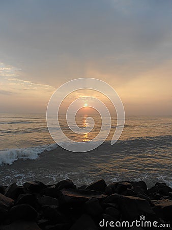 Sunrise in Puducherry, a quiet little town on the southern coast of India. Stock Photo