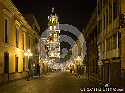 Puebla, Mexico, South America [Town of Puebla at night, street and church decorated with lights] Editorial Stock Photo