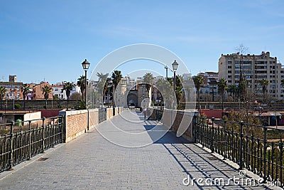 Puente de Palmas antique traditional bridge with towers in Badajoz, in Spain Editorial Stock Photo