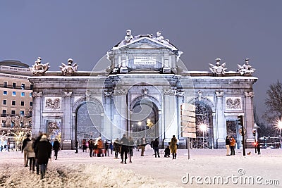 Puerta de AlcalÃ¡ in Madrid on a cold winter night Editorial Stock Photo