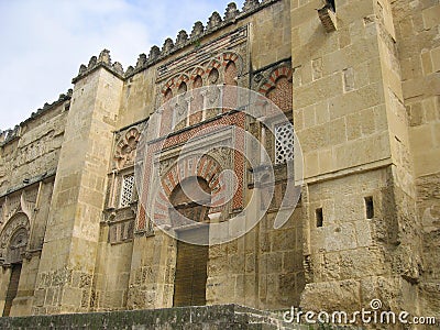 Puerta del Batisterio - the Fourth door of the east facade of the Great Mosque Mezquita, Catedral de Cordoba, in th sunny day, Cor Stock Photo