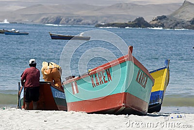 Puerto Culebras, Ancash, Peru Fishermen sail close to the coast at the seaside of Huarmey circa 2020 in Ancash, Peru Editorial Stock Photo