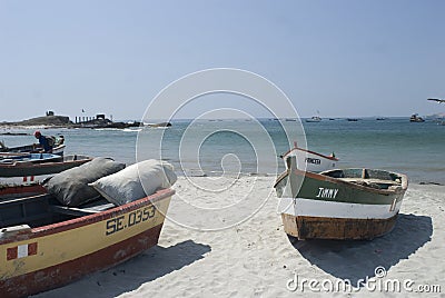 Puerto Culebras, Ancash, Peru Fishermen sail close to the coast at the seaside of Huarmey in Ancash, Peru Editorial Stock Photo