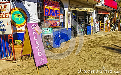 Colorful tourist street people stores restaurants bar La Punta Zicatela Editorial Stock Photo