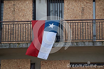 The Chilean flag is shown in many balcons and houses in Puerto Montt Editorial Stock Photo