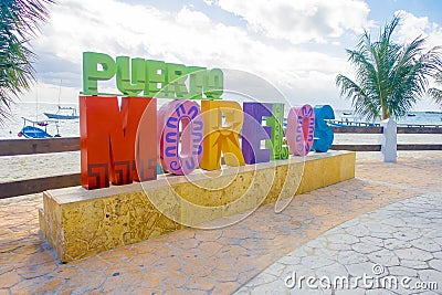 Puerto Morelos, Mexico - January 10, 2018: Outdoor view of a huge letters of puerto morelos in the park in Puerto Editorial Stock Photo