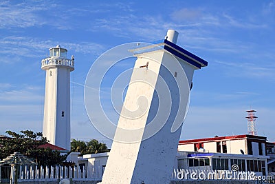 Puerto Morelos new and old inclined lighthouses Stock Photo