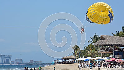 Parasailing is one of the most thrilling and popular beach activities Editorial Stock Photo