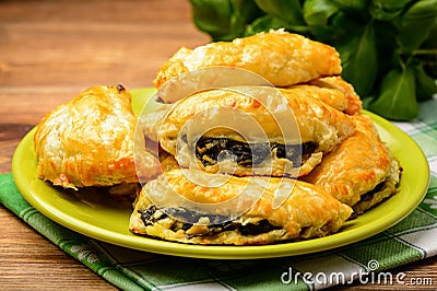 Puff pastries with spinach and cheese. Stock Photo