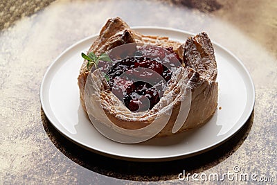 Puff pastry cake with berries on wooden background Stock Photo