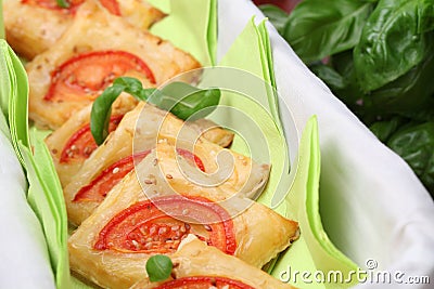 Puff pastry with cheese and tomatoes Stock Photo