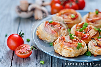 Puff pastry rolls with ham and chese. Baked snacks Stock Photo