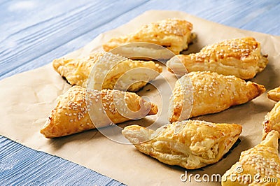 Puff pastry triangles filled with feta cheese and leek. Stock Photo