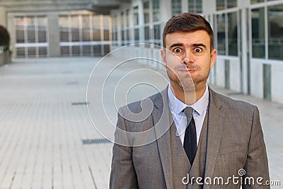 Puffed businessman feeling bloated with copy space Stock Photo