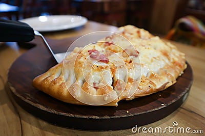 Puffed pizza, pizza puff Stock Photo