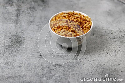 Puffed Rice garlic Known Murmura aur Sev Mamra lasaniya (spicy flavor) Stock Photo