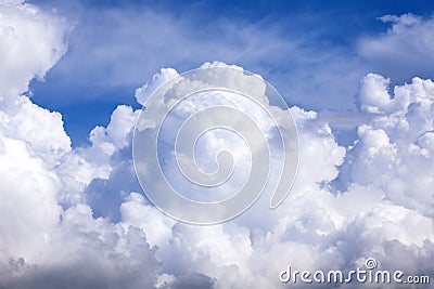 Puffy clouds blue sky Stock Photo