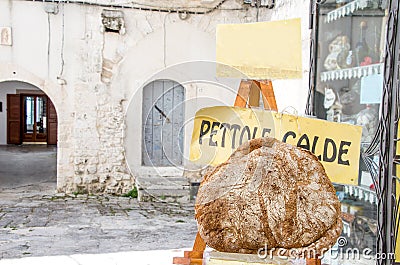 Pugliese bread in apulia village alley Stock Photo