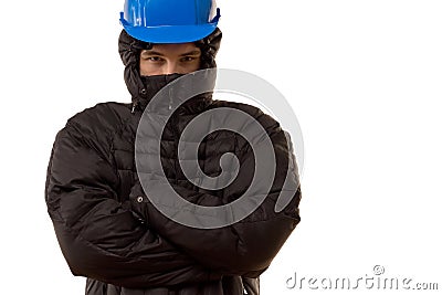 Pugnacious young thug with folded arms Stock Photo