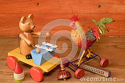 Pull toys and harmonica mouth organ. Vintage toy. Retro toys for boys and girls. Stock Photo