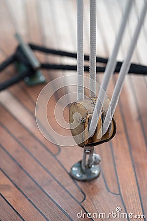 Pulley and rope on old sailing ship Stock Photo