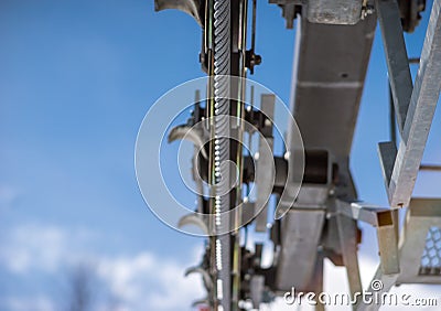 Pulley wheels on a ski chairlift tower Stock Photo