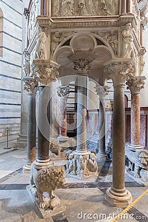 The pulpit of Nicola Pisano in the Pisa Baptistery of St. John i Editorial Stock Photo