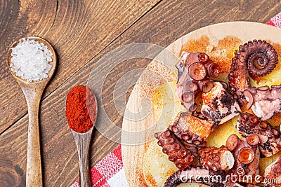 Pulpo a la gallega,galician octopus with ,potatoes paprika, salt and olive oil. typical Spanish Galician tapa, on a traditional Stock Photo