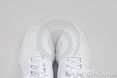 puma. white sneakers with laces on a white background. isolate. top view. Editorial Stock Photo