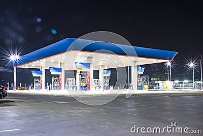 Pump gas on night. Editorial Stock Photo