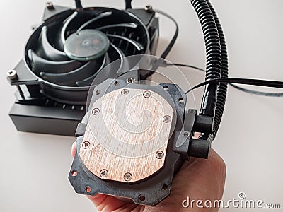 Pump with water block of computer chip water cooling system, heat removal from CPU and video card of high-level system components Stock Photo