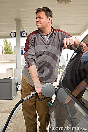 Pumping Gas at the Gas Station Stock Photo